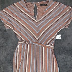 brand new crystal doll romper size S